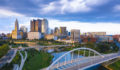 Aerial view of Downtown Columbus, Ohio, with the Scioto River during sunset.