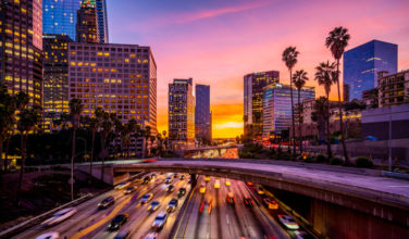 Breakthrough bets on life sciences rebound with $430m fundraise Cars in traffic in Downtown Los Angeles at sunset.