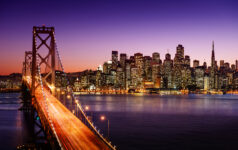 Bay Bridge and San Francisco skyline at sunset