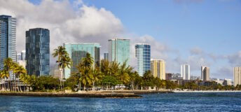 Ala Moana Beach Park with skyline view of Honolulu, Hawaii