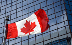 OTPP disbands Asia real estate team amid regional retrenchment Canadian flag in front of modern building.