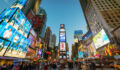 Amazing vibrant Times Square crowded with tourists and people sightseeing. New York City, Manhattan, USA.