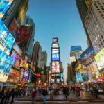 18 months later, Blackstone still sees real estate comeback ahead Amazing vibrant Times Square crowded with tourists and people sightseeing. New York City, Manhattan, USA.
