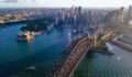 Aerial drone view of Sydney City and Sydney Harbour showing Sydney Harbour Bridge, NSW Australia in the late afternoon