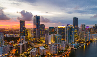 Starwood eyes โattractive entry pointโ after $10.2bn close for Fund XIII A panoramic view of Miami's Brickell submarket at sunset.