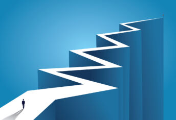 The path to scale rarely runs smoothly An illustration of a businessperson standing at the beginning of a long, zig-zagging road