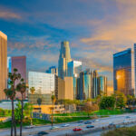Dusk light with dramatic clouds in downtown Los Angeles and freeway,California