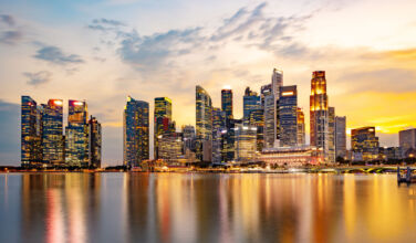 Schroders’ Asia real estate head to step down Moody Sky at Sunset with Reflection in Marina Bay, Long Exposure to Blur Water