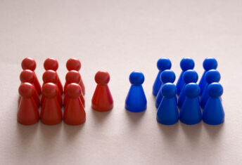 Boom or bust, AI has cleaved the real estate industry in two Two groups of plastic figurines.