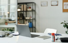 Kayne Anderson: Medical office buildings prove defensive, durable and in demand Telehealth, computer, doctor, desk, medical office building, T5