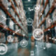Macquarie on logistics real estate’s transition as global markets reset A network of logistics and supply chain icons superimposed over a blurred warehouse, illustrating interconnected systems, transportation, and global distribution. T5