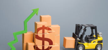 Forklift near a stack of dollar boxes with a green up arrow. Sales growth concept. Production and freight of goods. Increase in imports and exports, economic recovery. World trade traffic. High income. Industrial. Logistics. T5