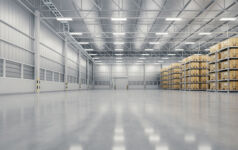 3d rendering of warehouse industry building interior. known as distribution center, retail warehouse. Included cardboard box on shelf, empty space on concrete floor suit for industrial background. Logistics. T9
