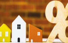 Image of houses with a percent block next to them.