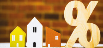 Image of houses with a percent block next to them.