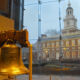 The Liberty Bell displayed at Liberty Bell Center located in Independence National Historical Park in Philadelphia Pennsylvania. Independence Hall can be seen in the background.