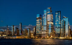 Prologis CIO joins Tishman Speyer to lead global expansion Wide view of Hudson Yards skyline and Vessel at night. Panoramic night shot of Manhattan west side with illuminated Vessel and Hudson Yards modern skyscrapers.