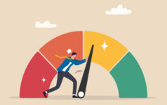 Kayne Anderson on taking an alternative approach to core real estate Image a professional pushing the arrow of a gauge from orange to yellow.
