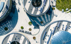 Redefining core real estate Image of the tops of buildings.