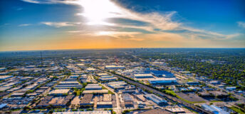 A commercial district consisting of numerous warehouses, manufacturing facilities and retail outlets located in the city of Garland, Texas just outside of Dallas shot via helicopter from an altitude of about 400 feet.